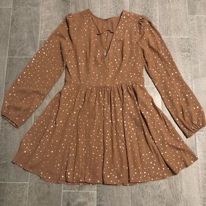 BCBG dress. Long sleeve, tan with gold stars. Size 12. Never worn.